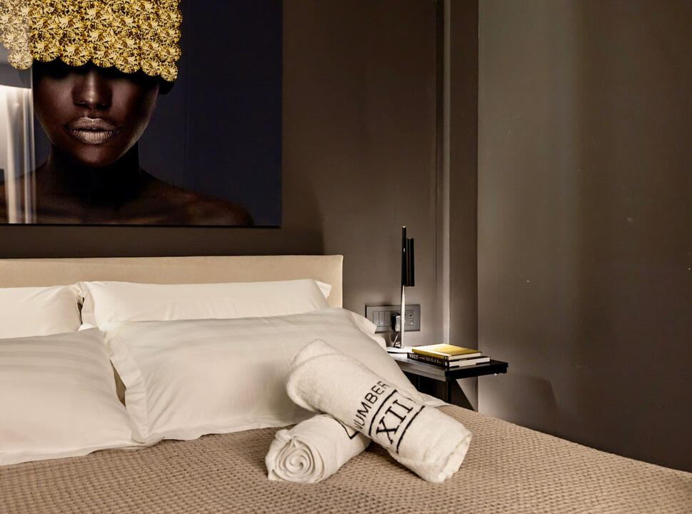 Bedroom with king-sized bed and premium linens